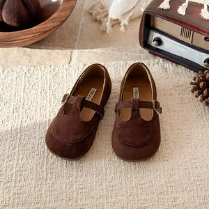 Vintage brown suede T-strap Mary Jane shoes for girls with retro radio background
