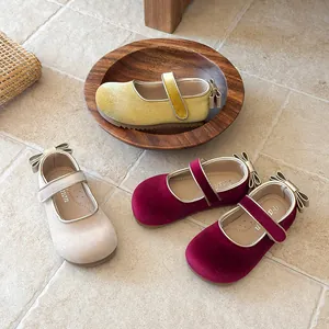 Detailed close-up showing soft-sole velvet Mary Janes for girls in multiple colors