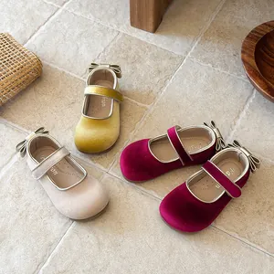 Elegant girls' velvet Mary Jane shoes in yellow, beige, and wine red with bow detail