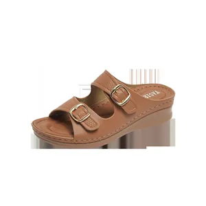 Elegant women's brown wedge sandals with adjustable double buckle straps and stitching