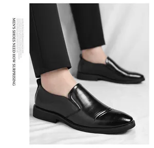Close-up detail of classic black leather men's business slip-on formal dress shoes