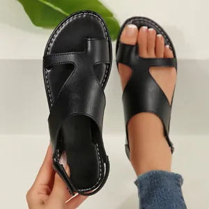 Schwarze flache Römersandalen für Damen mit Zehenschlaufe und Klettverschlussband