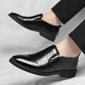 Elegant black men's business formal leather shoes in a slip-on style with textured details
