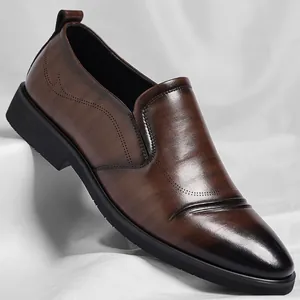 Elegant brown men's business formal slip-on leather shoes with burnished toe