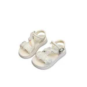 Elegant girls' princess style sandals featuring white lace bows and platform soft soles.