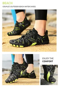 Close-up detail of flexible black and neon green outdoor water shoes for beach