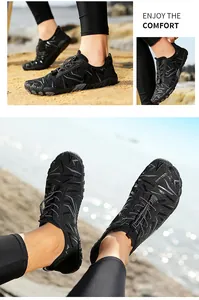 Detailed macro shot of breathable black water shoes for outdoor beach and swimming use