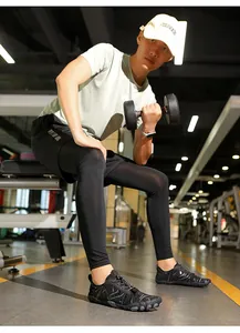Cross-training water shoes shown on male model in gym environment