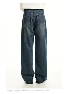 Back view of men's vintage washed loose straight-leg denim jeans in dark blue