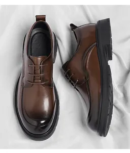 Close-up of classic brown leather dress shoes for men with burnished toe and lace-up design