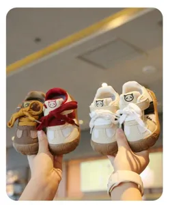 Detailed view of breathable mesh toddler walking shoes with soft non-slip soles.