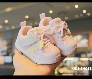 Toddler pink mesh sneakers with soft anti-slip soles and Velcro straps for kids.