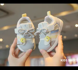 Detailed view of breathable mesh toddler sneakers with cute bear charms