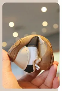 Detail showing the extreme flexibility and soft sole of the breathable baby walking shoe