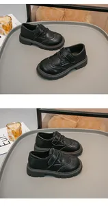 Vista dettagliata di scarpe in pelle nera per bambini stile britannico con brogue