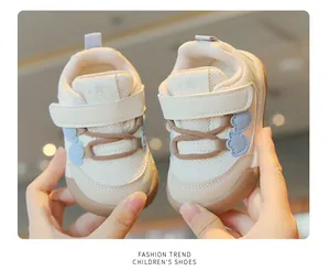 Close-up detail of breathable mesh toddler walking shoes with soft non-slip soles