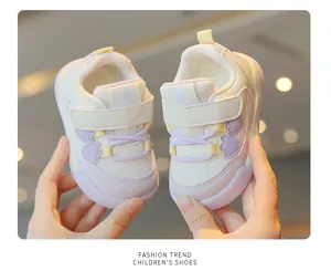 Close-up of cute breathable mesh baby walking shoes with soft soles and velcro