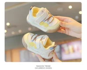Macro view of breathable mesh toddler shoes with soft soles and pastel color accents