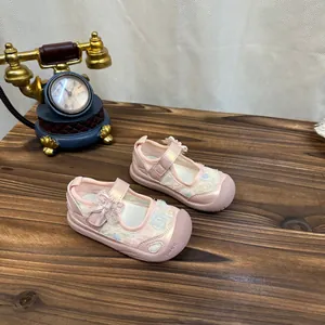 Detailed view of pink floral mesh toddler girl princess sandals with bow detail