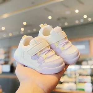 Breathable mesh baby walking shoes with soft anti-slip soles in cream and lavender