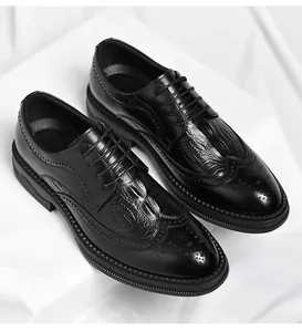 Detailed view of men's black Brogue shoes with crocodile-embossed leather texture