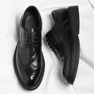 Professional black men's formal leather shoes with crocodile texture and brogue details