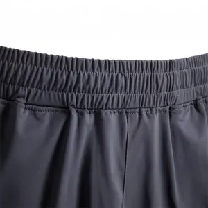 Detailed macro shot showing high-stretch elastic waistband of men's summer sports shorts