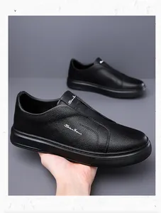 Close-up of black pebble grain leather slip-on shoes with soft anti-slip sole for men