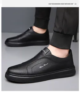 Close-up of black men's leather loafers with non-slip soft sole and grainy texture