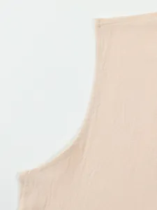 Detailed view of breathable beige cotton linen fabric and armhole stitching for men's vest.