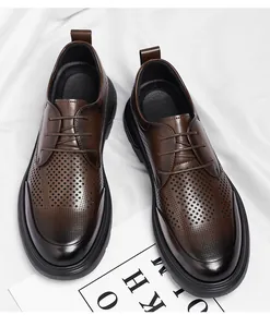 Close-up detail of brown hollow-out breathable business casual leather shoes for men