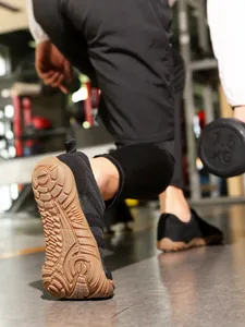 Lightweight black barefoot training shoes with wide toe box and non-slip rubber sole for men.