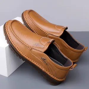 Men's brown genuine leather slip-on casual loafers featuring premium hand-stitched detailing
