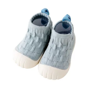 Soft knitted baby pre-walker shoes with white anti-slip rubber sole.