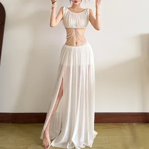 Sexy white mesh skirt set featuring a pearl chain crop top and high slit maxi skirt.