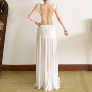 Detailed back view of white sexy pearl chain crop top and mesh maxi skirt set for women