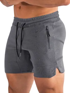 Vista ravvicinata di pantaloncini sportivi grigi con tasca laterale e vita elastica