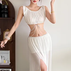 Detailed look of elegant white mesh skirt set with multi-layer pearl waist chains