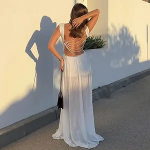 Elegant backless white mesh dress set featuring luxurious multi-layer pearl chain details.