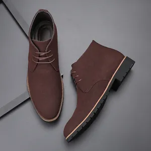 Detailed side and top view of dark brown suede lace-up men's chukka boots