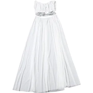 Elegant white two-piece set featuring a ruched top and mesh maxi skirt with chain detail.