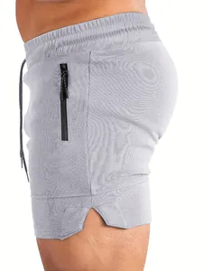 Primo piano di pantaloncini da corsa grigi da uomo con tasca laterale e texture