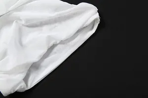 Close-up detail of the breathable white sheer mesh fabric texture for sexy skirt set