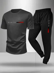 Détail de l'ensemble de sport d'été noir pour homme avec imprimé PARIS et bande rouge