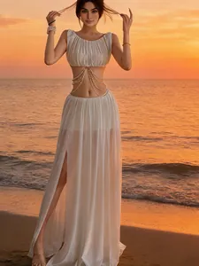 Elegant white two-piece set featuring pearl chain top and sheer mesh slit skirt