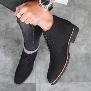 Stylish men's matte black suede lace-up desert boots featuring a sleek pointed toe design