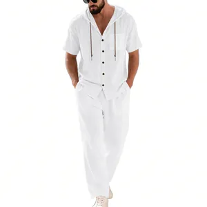 Full-length view of a men's white linen short-sleeve hooded shirt and loose beach pants set