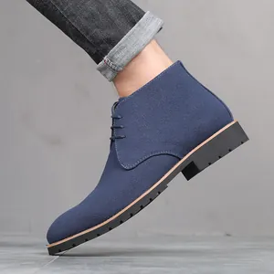 Detailed side profile of navy blue suede lace-up Martin boots with pointed toe design