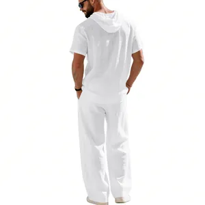 Back view of men's white linen hooded short sleeve shirt and loose trousers beach set