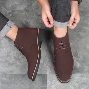 Classic men's brown suede lace-up Martin boots with a stylish pointed toe design